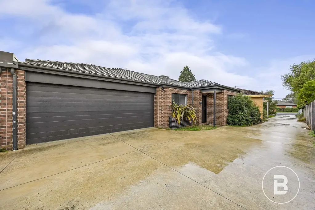 QUALITY BUILT - WELL KEPT THREEE  BEDROOM TOWN HOUSE