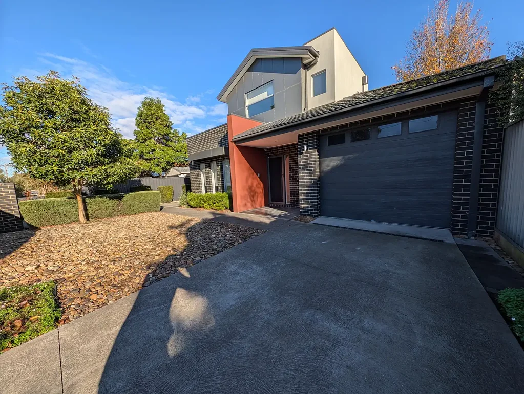 Immaculate three bedroom townhouse with own street frontage