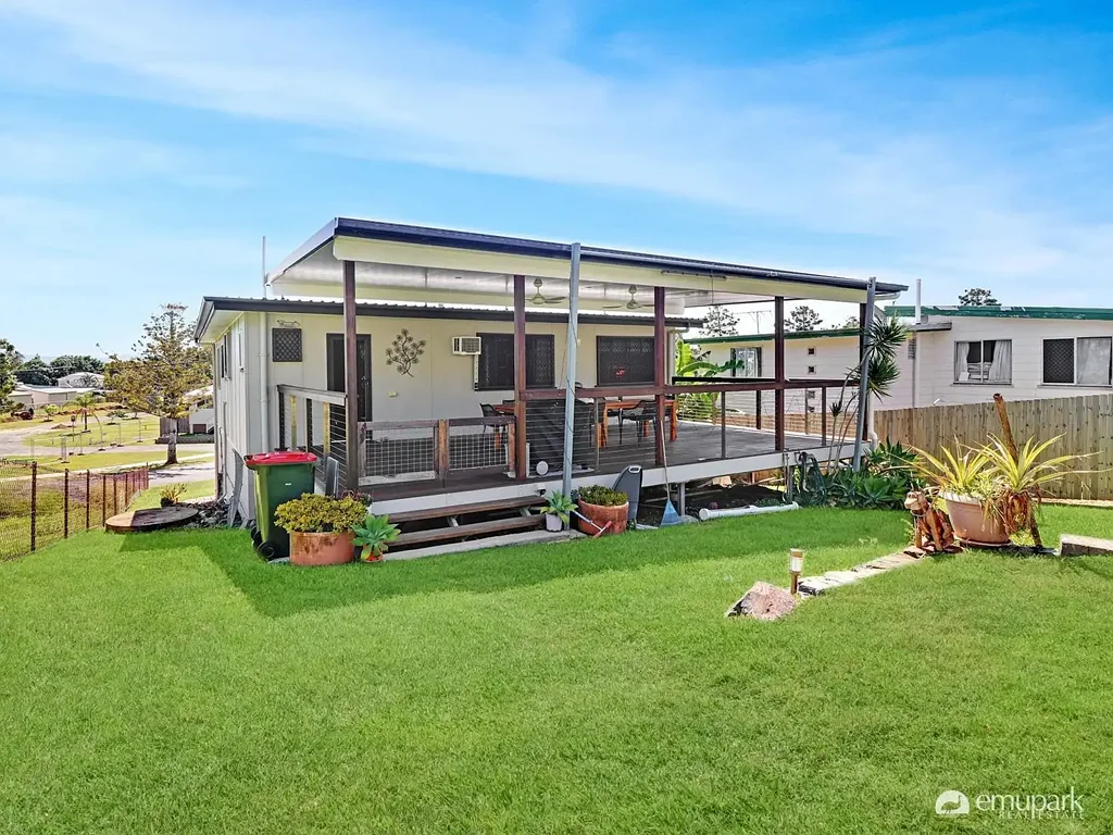 Keppel Sands 3 Bedroom Charming Highset Home with Coorooman Creek Views & Exceptional Outdoor Living!