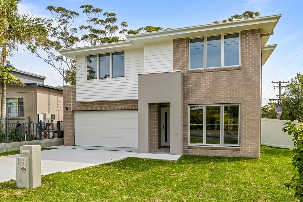 Spacious & Modern: 5-Bedroom Coastal Home with EV Charger