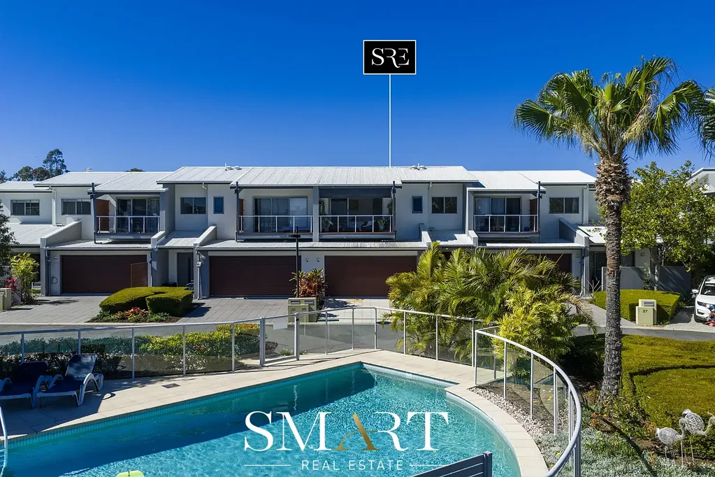 Coombabah 3房  Live the Resort Dream! — Walk around the Lake while living in the Secure Gated Estate "Laguna One" with Master Balcony Overlooking Pool, Spa & BBQ!