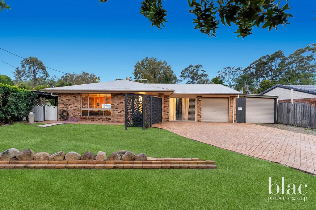 Petrie 5 Bedroom Generous 5-Bedroom Home with Home Office and Drive-Through Garage