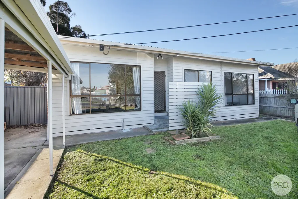 THREE BEDROOM HOME WITH LARGE REAR YARD