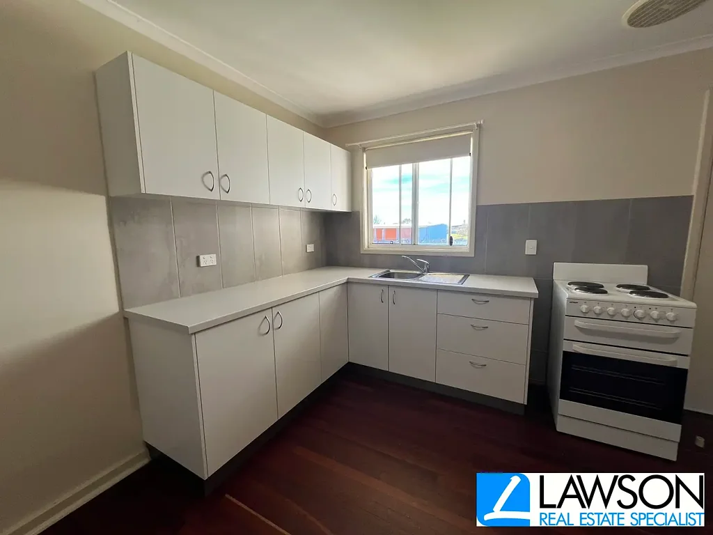 Charming Duplex with a Spacious Yard!