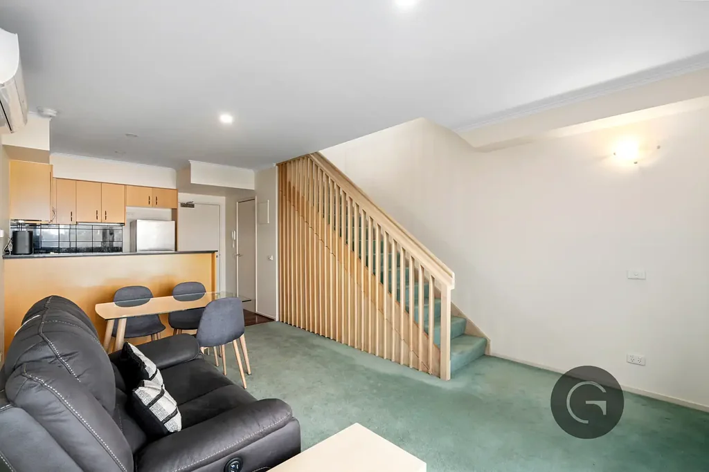 Stylish Fully Furnished Two-Level Apartment with City Views & Private Terrace