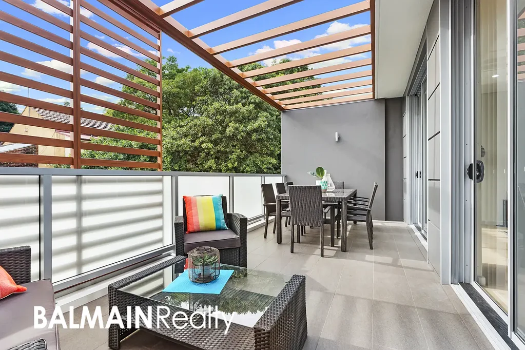 Top Floor North Facing Apartment with Two Balconies, Ducted Air Conditioning & Two Secure Car Spaces with over bonnet storage
