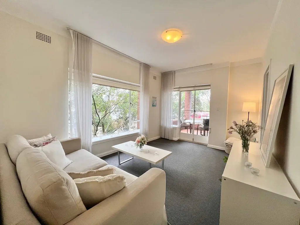 Cutest art deco, large windows, leafy green outlook, balcony, security and small car space!