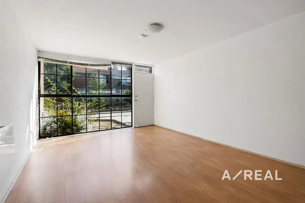 Spacious Two-Bedroom Townhouse with Private Yard