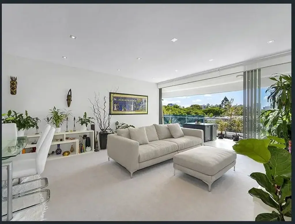 Elegant Riverside Living in West End’s Premier Waters Edge Complex