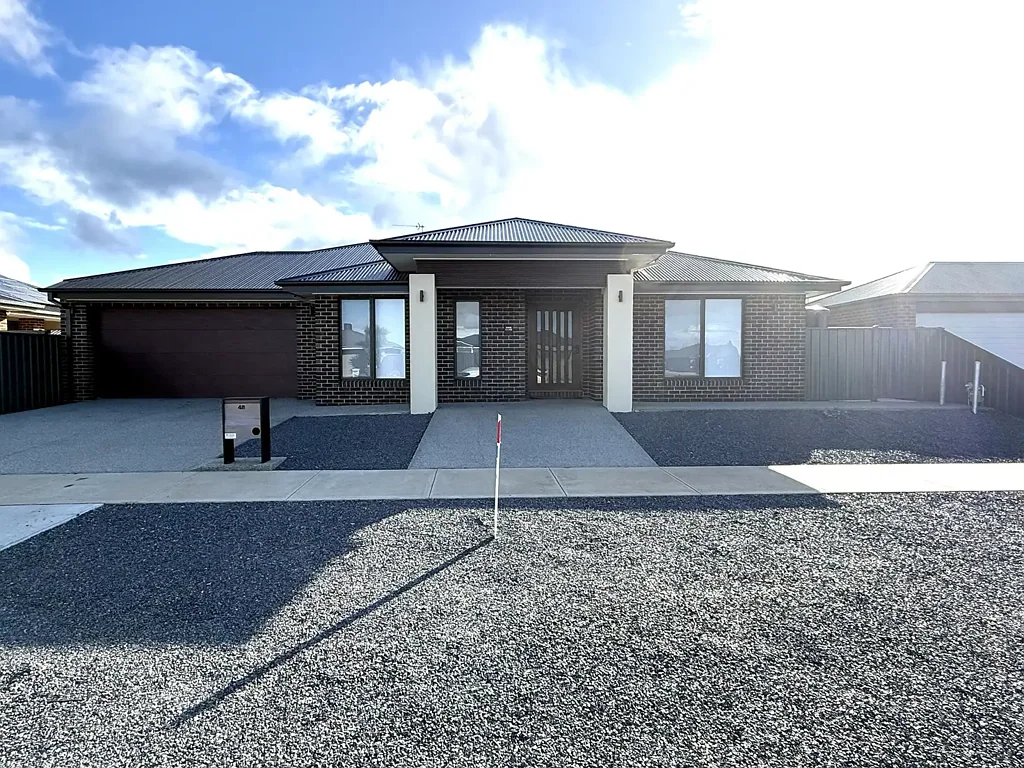 Neat as a Pin ~ Four-Bedroom Near-New Home with Zero Yard Maintenance