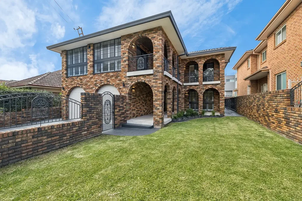 Strathfield 5 Bedroom Fully renovated full-brick residence set along a prestigious tree-lined Boulevarde