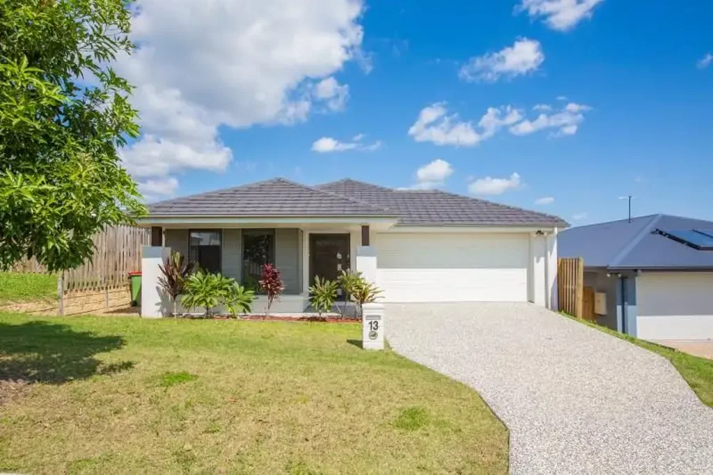 MODERN NEAR NEW HOME WITH MANY EXTRAS!