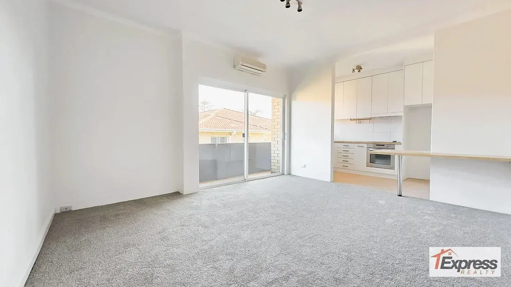 BRIGHT ONE BEDROOM WITH NEW CARPET, NEW PAINT & PARKING