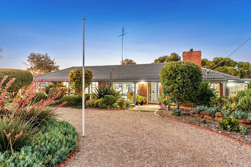 Acreage Living with Beautiful Gardens and Outdoor Space