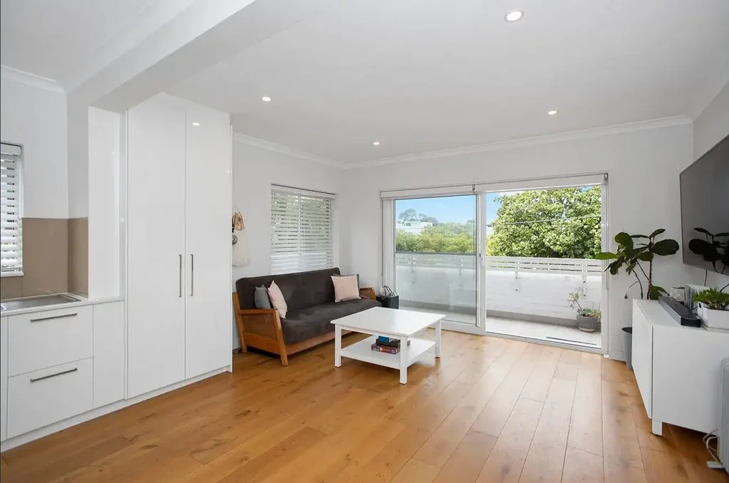 Modern, Sun-Drenched Apartment with Leafy Views and Prime Location