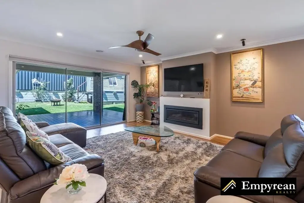 Spacious Family Home with Large Yard, Multiple Living Zones & Minutes from Schools & Shops!