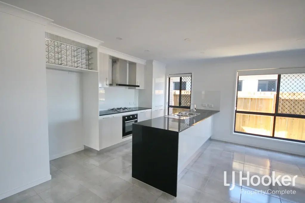 Low Maintenance Family Home With 2 Living Areas!