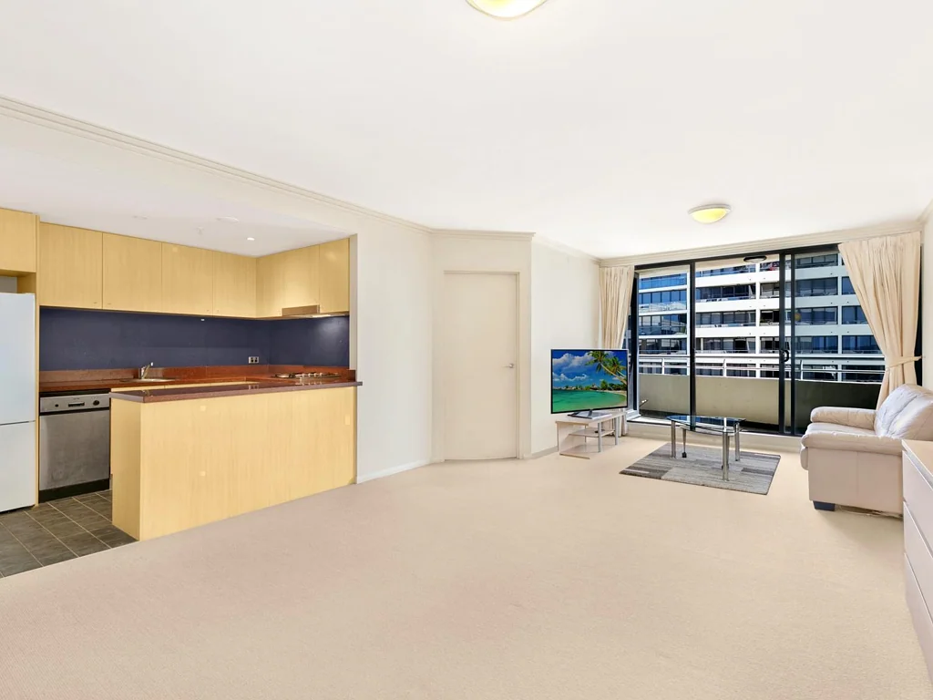 Freshly Painted One-Bedroom + Study Apartment with City Views