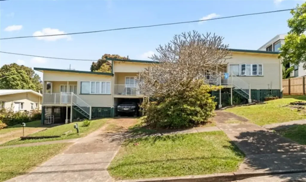 Two bedroom timber flat with front balcony/landing.