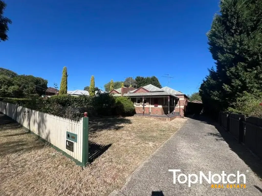 UNDER APPLICATION!!  Spacious 2-Bedroom Unit - Low Maintenance & Super Convenient!