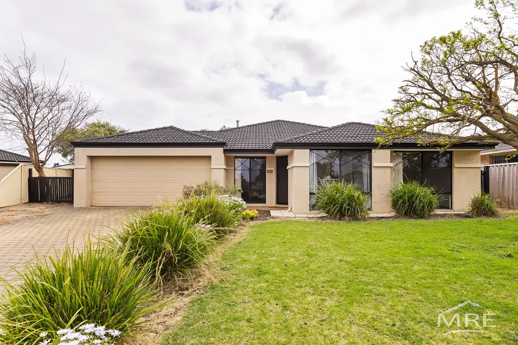 LIVING SPACE GALORE IN A QUIET CUL-DE-SAC
