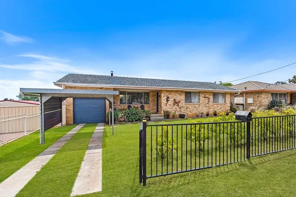 THREE BEDROOM HOME WITH SECURE YARDS & SHEDS