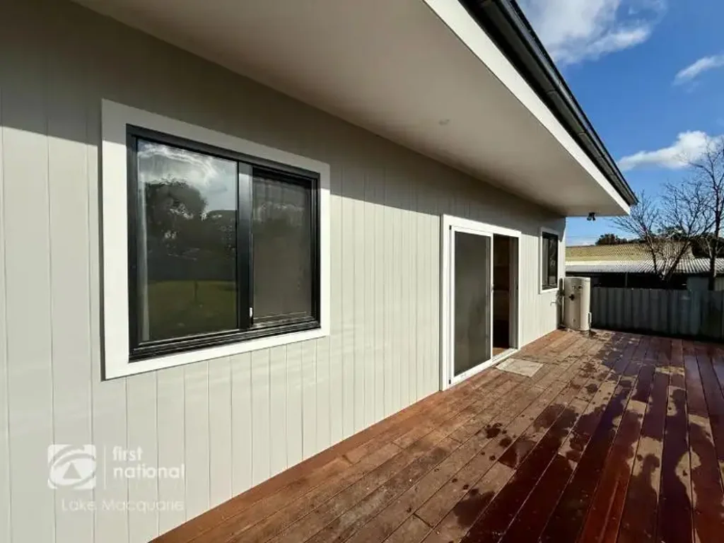 Beautifully Renovated Two Bedroom Unit with rear deck overlooking the backyard