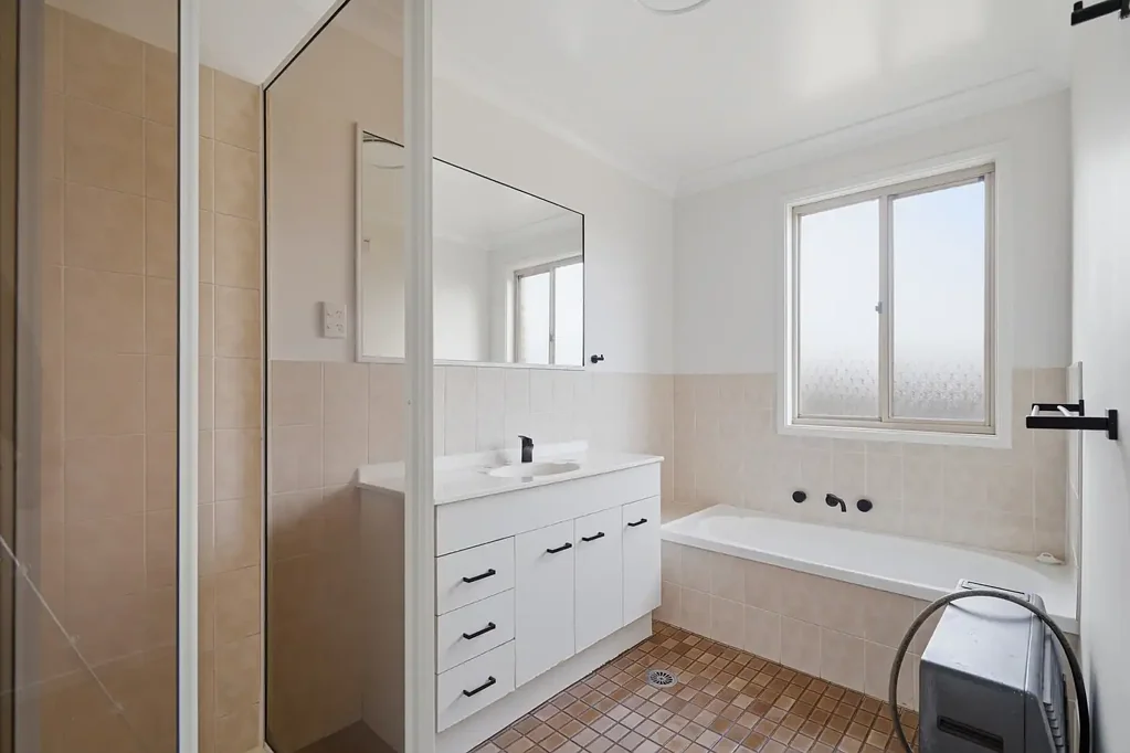 Freshly Updated Unit with Spacious Living & Large Enclosed Yard