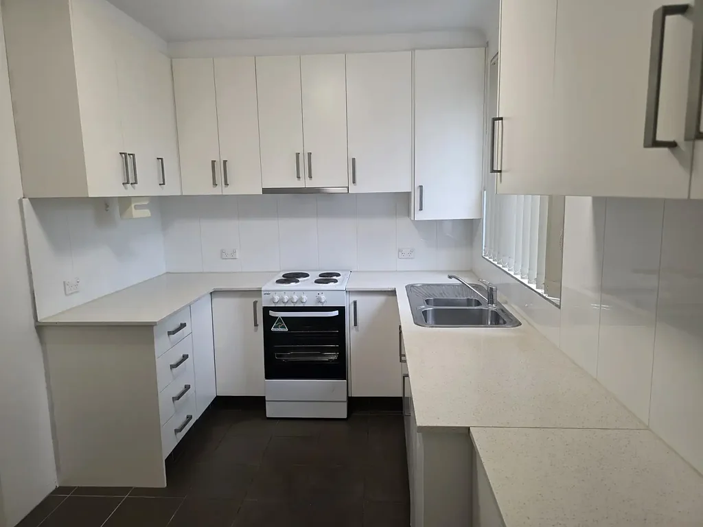 NEWLY & TOTALLY REDECORATED APARTMENT WITH A LOCK UP GARAGE AND STORAGE.