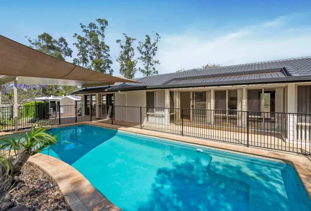 Spacious Family House with Pool & Acreage Living!