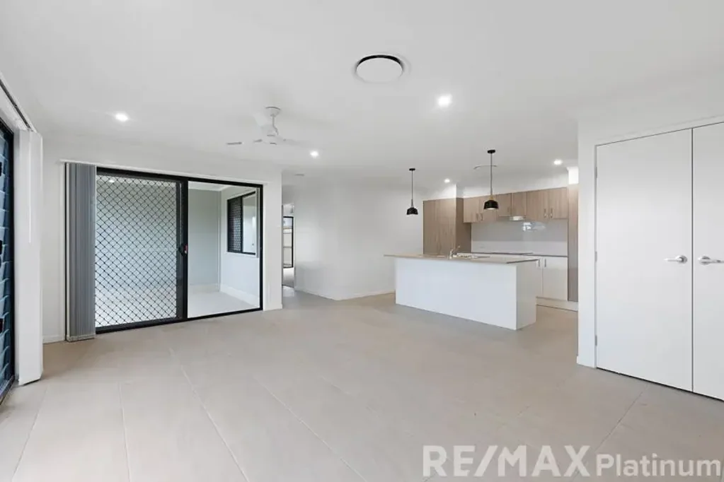 Spacious Home with Stunning Kitchen & Side Access.