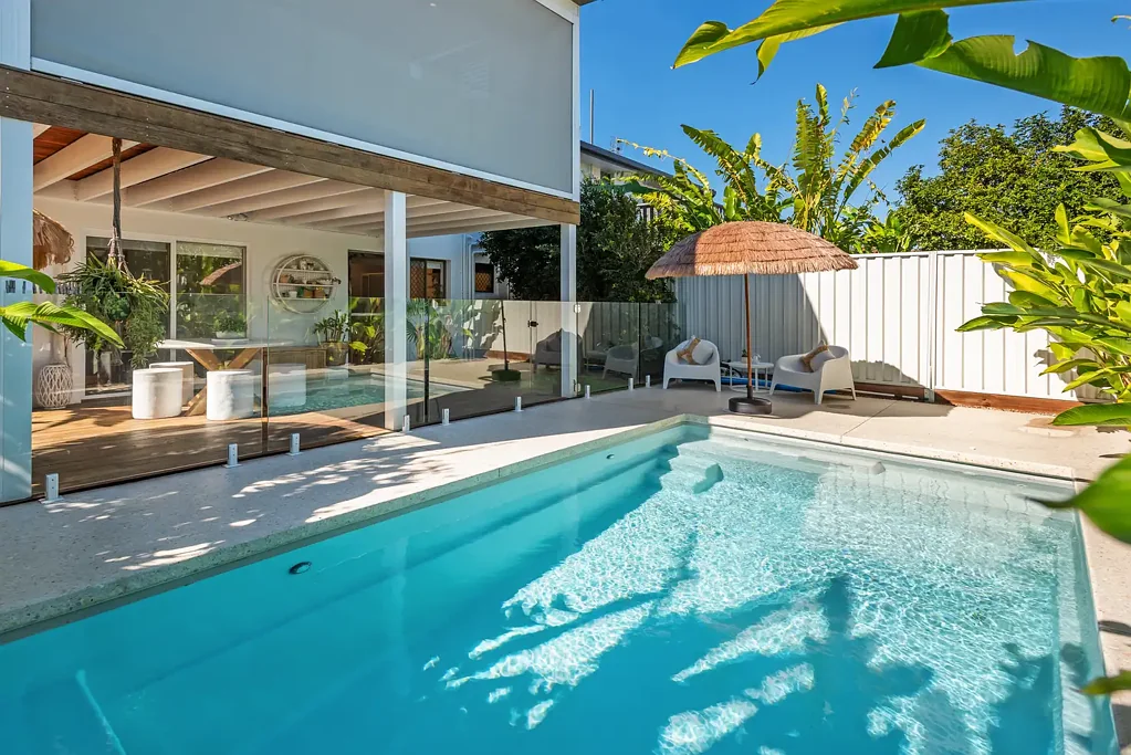 Runaway Bay 4 Bedroom RARE FIND IN A PRIME LOCATION - OVERSIZED BEACH-INSPIRED DUPLEX WITH PRIVATE POOL - INSPECT BY APPOINTMENT ONLY