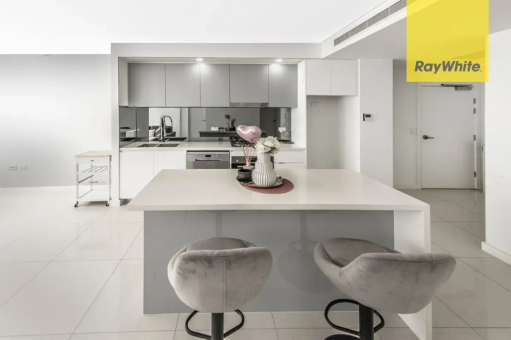 STUNNING TWO BEDROOM PLUS STUDY ON 9TH FLOOR WITH PARRAMATTA SKYLINE VIEWS -  LIVING BY THE RIVERBANK