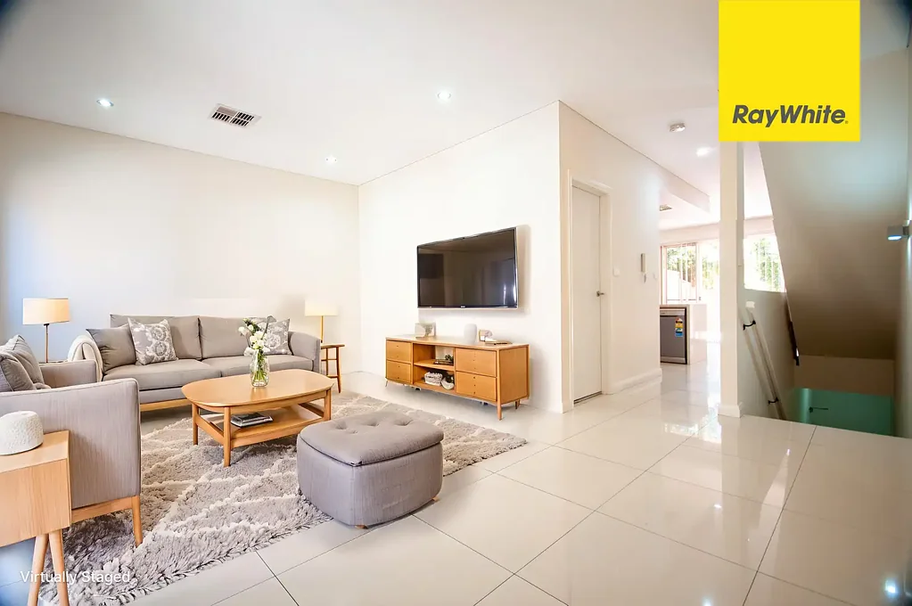 CONTEMPORARY THREE BEDROOM TOWNHOUSE IN MOST SOUGHT AFTER LOCATION