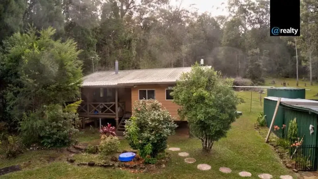 Ravenshoe 3 Bedroom Charming 3-bedroom, 1-bathroom 1980s family home nestled on a spacious 1.7-hectare- Ravenshoe