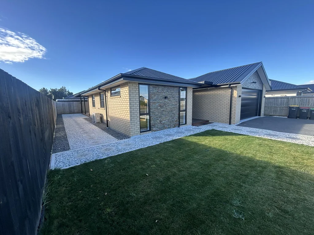 Modern and well presented home in Wigram offers comfortable living in a great location directly opposite the reserve.