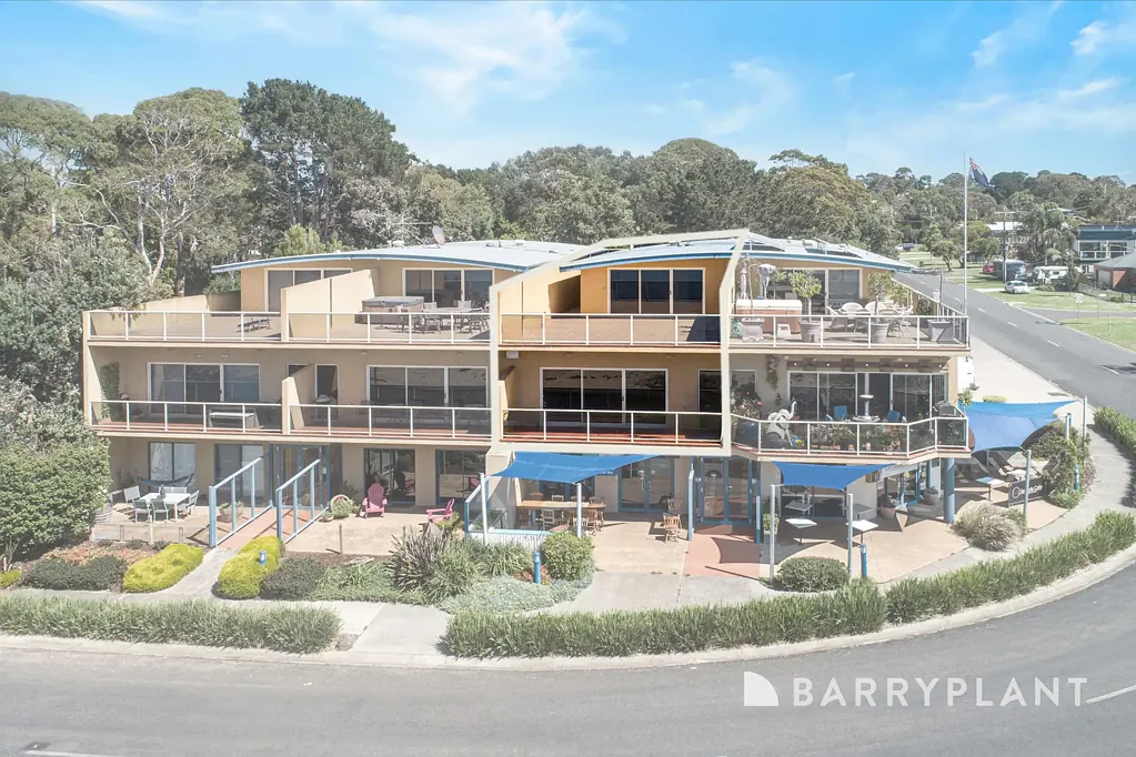 Furnished dual-level penthouse on Phillip Island with expansive bay views.