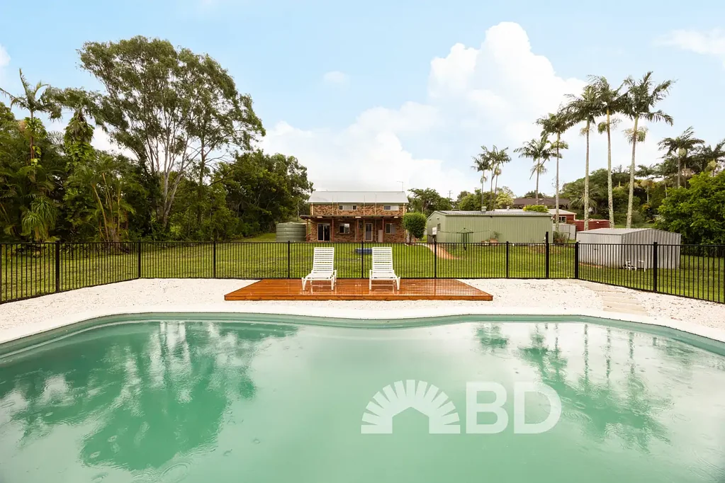 Spacious Renovated Acreage Home with Pool & Shed