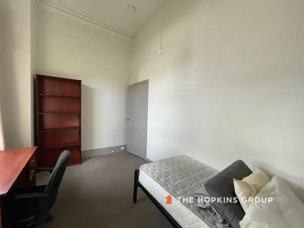 LOVELY AND WELL-LOCATED ROOMING HOUSE