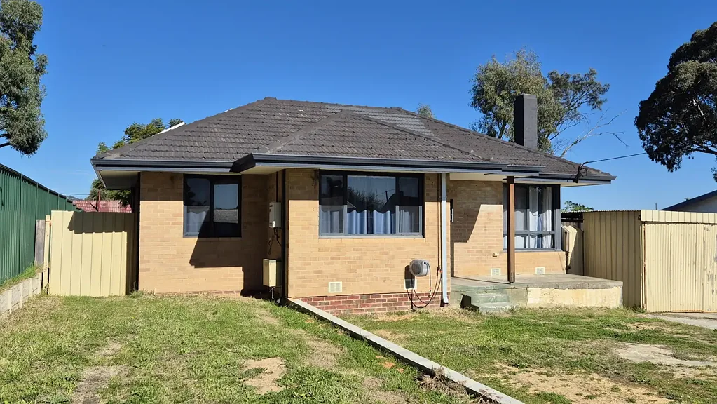Neat and Affordable Three-Bedroom Home with Solar Panels and Generous Outdoor Space