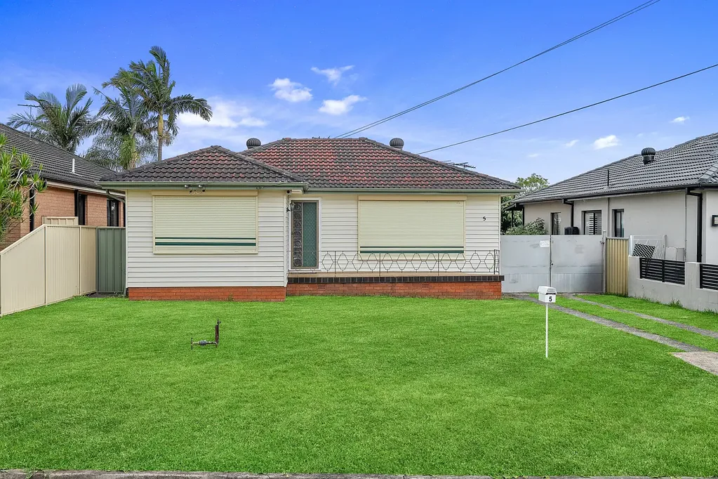 Freshly Updated Family Home with Generous Yard & Garage