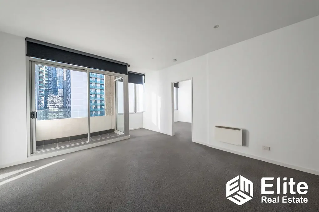 Unfurnished Two-Bedroom Apartment with Secure Car Space & Rooftop City Views