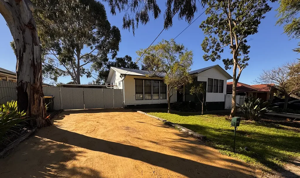 THREE-BEDROOM HOME IN WELL DESIRED LOCATION