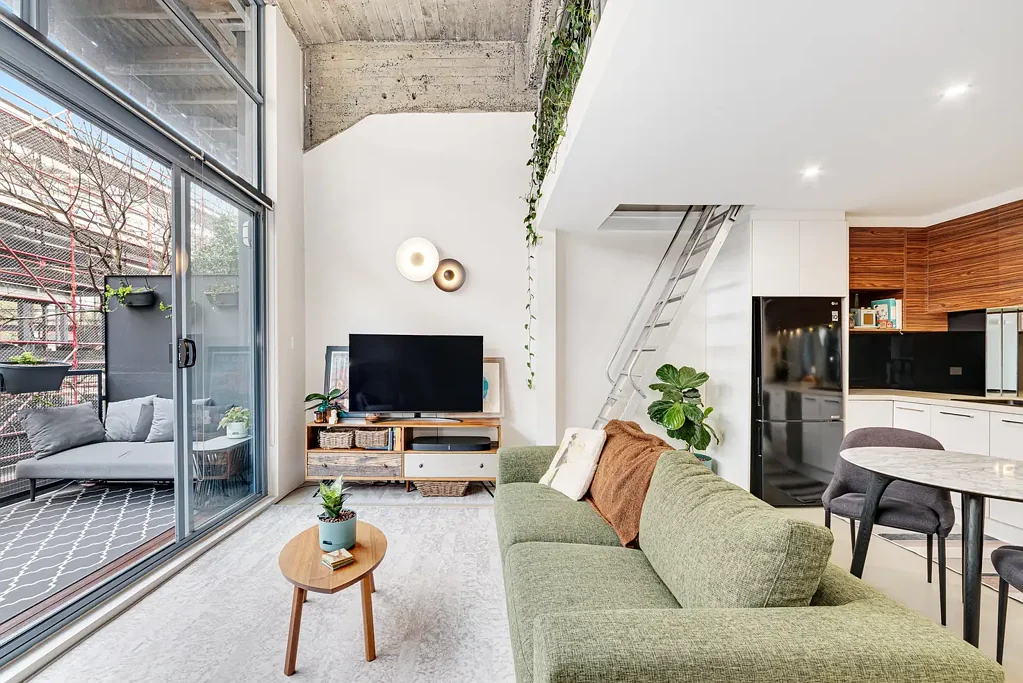 Light Filled Warehouse Conversion with Mezzanine Loft