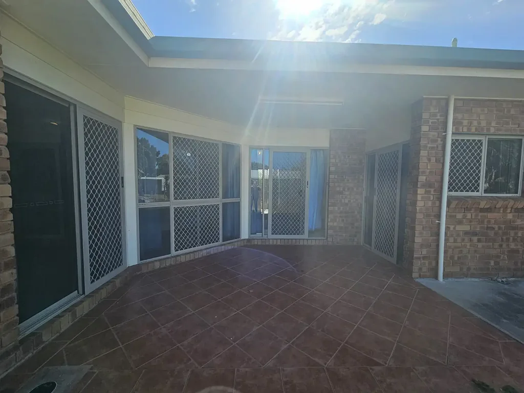 Four Bedrooms plus additional bedroom or rumpus, plus shed - walking distance to Emerald State High School