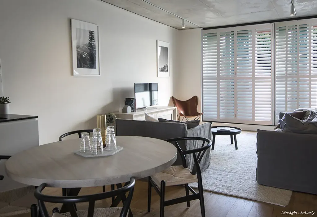Modern elevated apartment in sought-after building