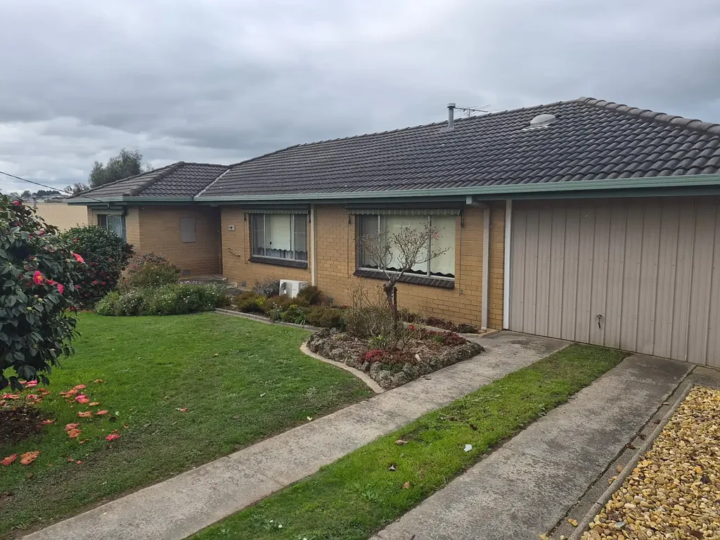 Walk to the shops from this classic residence on huge block