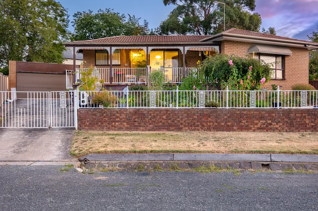 Golden Point 3 Bedroom Charming Central Brick Home with Stunning City Views and Endless Potential