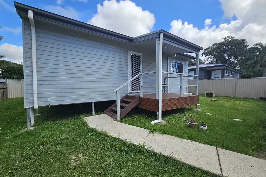 NEAT & TIDY HOME WITH DETACHED GARAGE & SPACIOUS YARD
