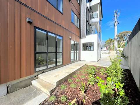 The one! Downstairs corner apartment with large patio and separate entrance